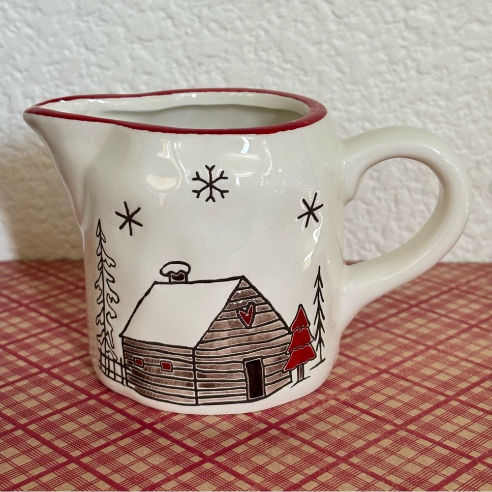 Potter’s Studio Mountain Ski Village Lodge Winter Scene Red Trim Creamer NEW